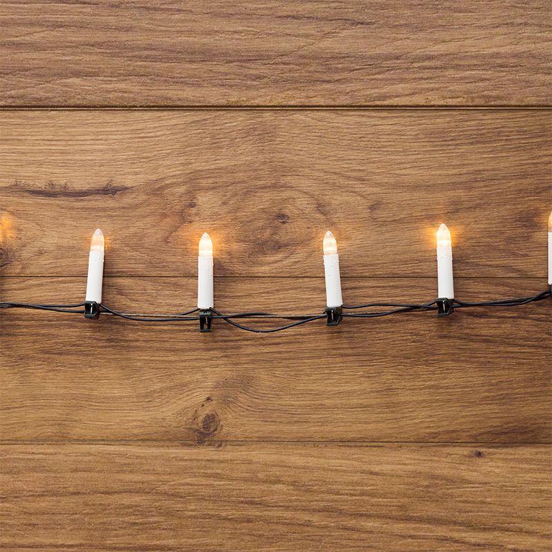 Гирлянда светодиодная "Свечи" 10м 50LED тепл. бел. 4Вт 220-240В IP20 провод ПВХ темн. зел. Neon-Night 303-085 купить оптом выгодно Гирлянда светодиодная "Свечи" 10м 50LED тепл. бел. 4Вт 220-240В IP20 провод ПВХ темн. зел. Neon-Night 303-085 оптом купить цена
