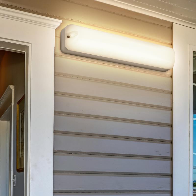 Large covered porch with railings and outdoor seats